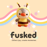 Fluffies™ Penguin Dressed as a Frog